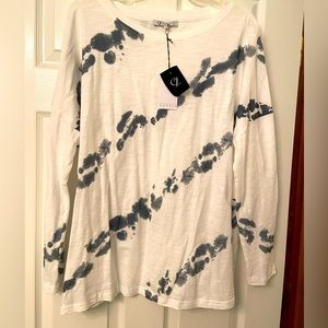 White and grey long sleeved women’s top size large. Brand new